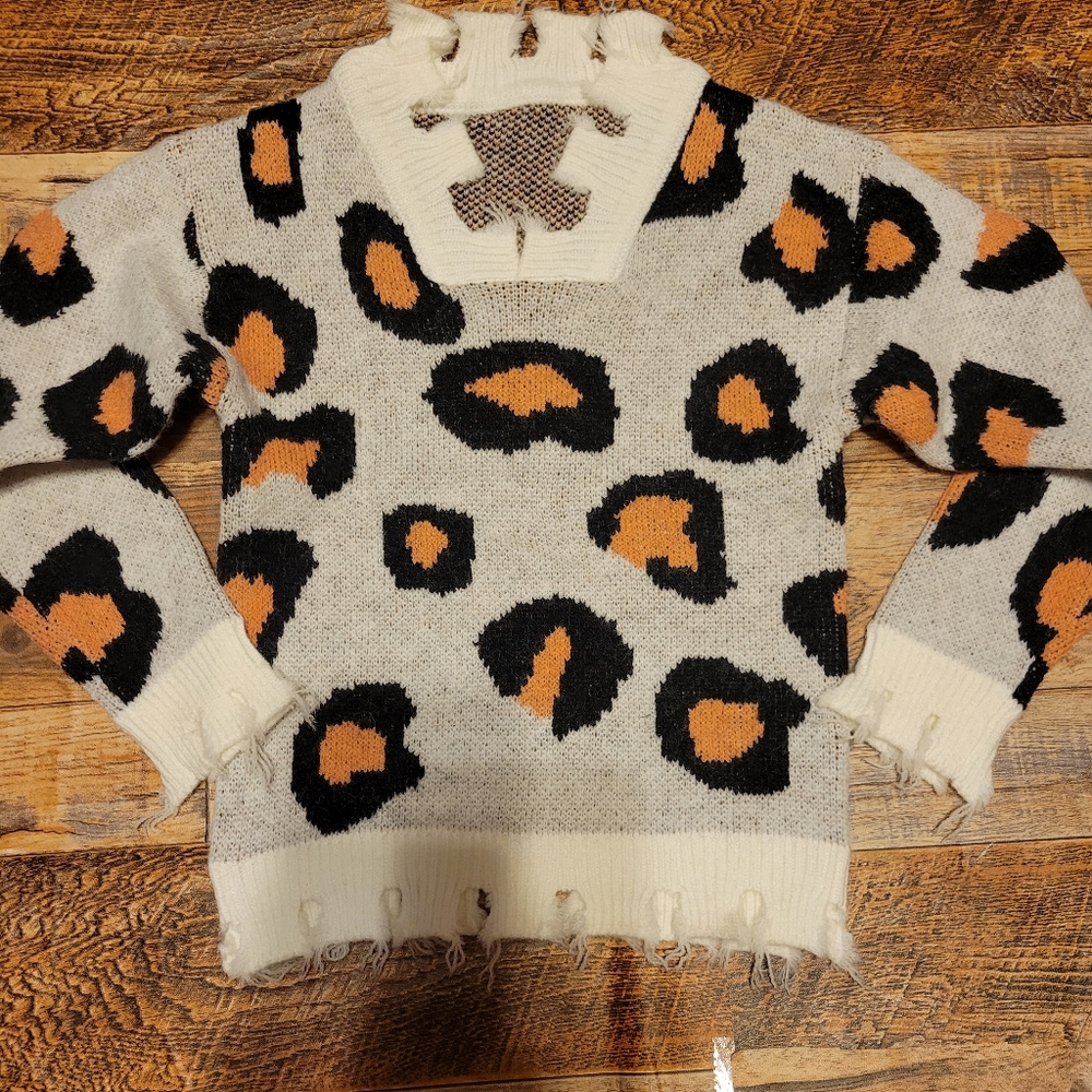 Leopard distressed sweater